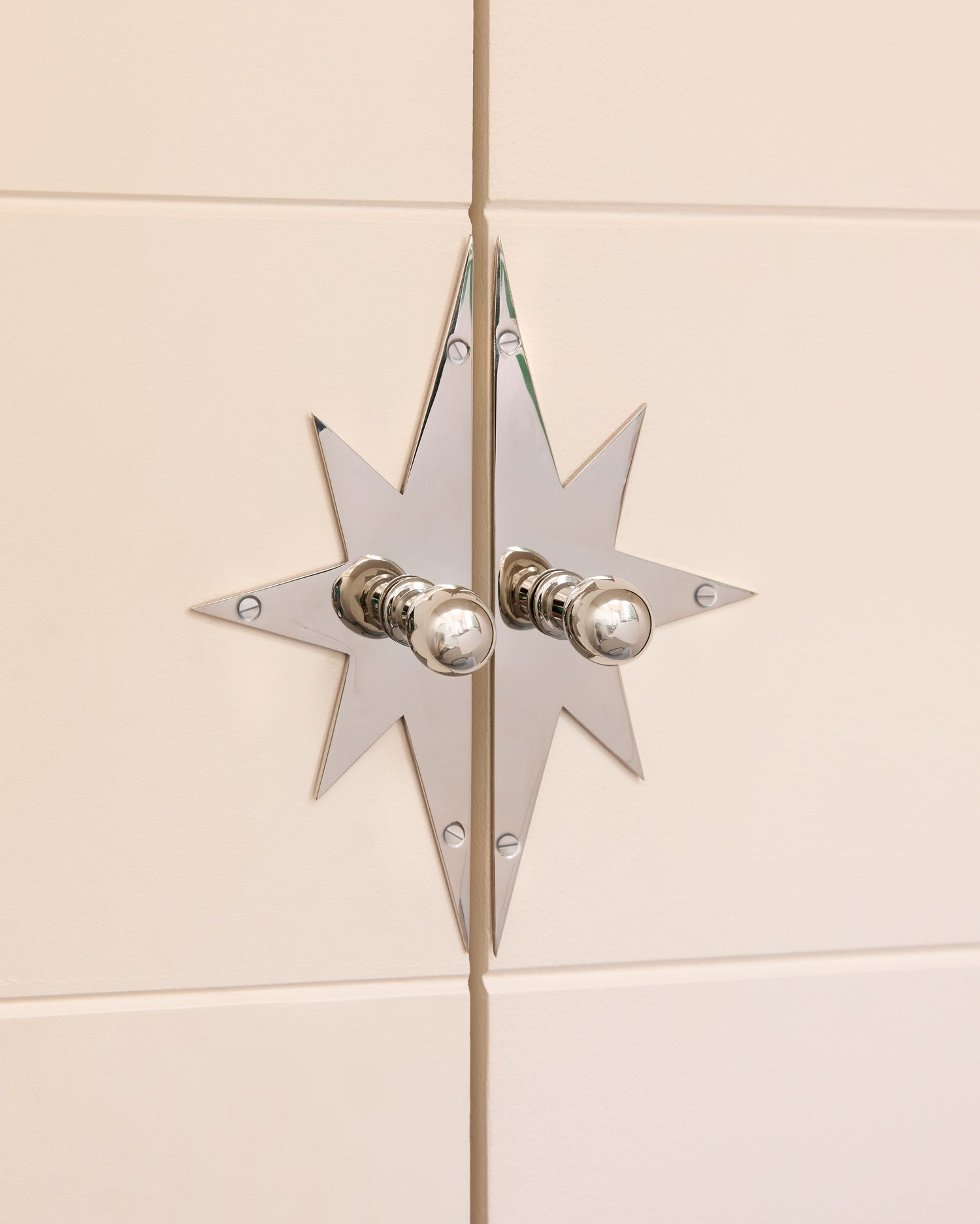 Pair of Star Backplates, Polished Nickel